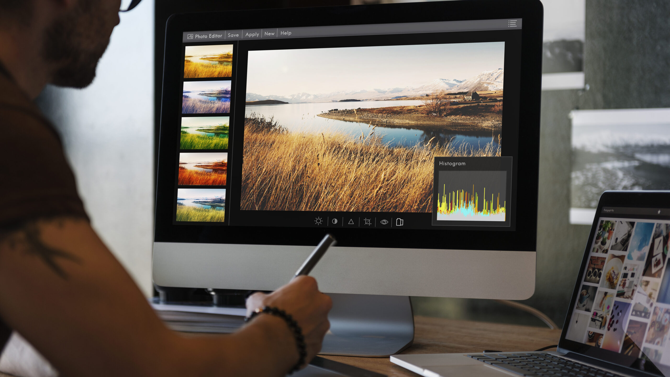 Man editing photos on a computer